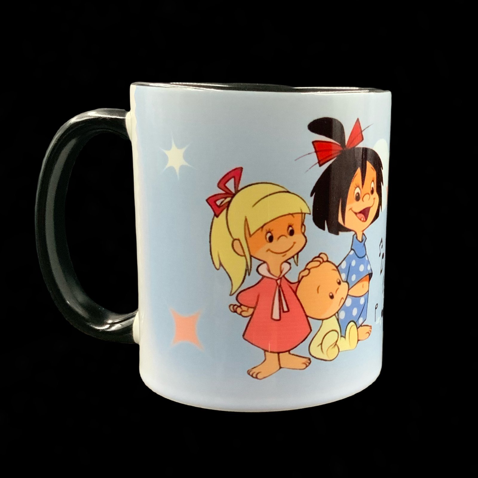 Taza familia Telerín azul 2 Taza Familia Telerin azul, vista detalle lado izquierdo, ceramica