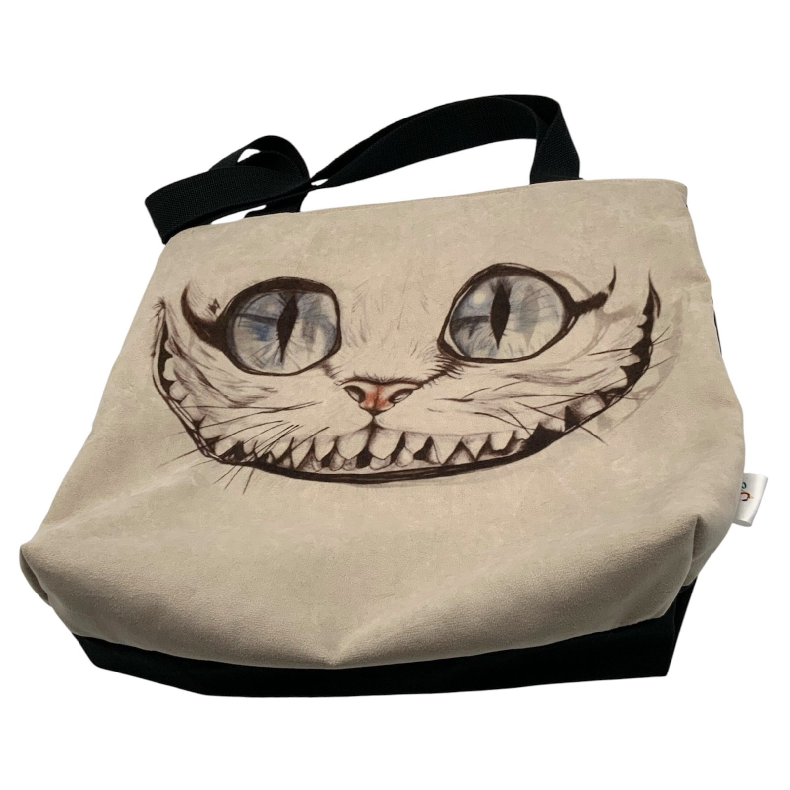 Bolso gato Cheshire 2 bolso del gato cheshire, vista desde abajo y detalle del fuelle